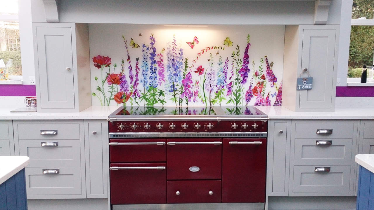 Bespoke Glass Splaskback Commission Norfolk behind a red range cooker in a country kitchen