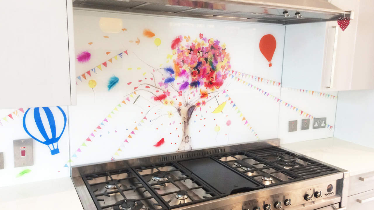 Whimsical Glass Splashback Carshalton Comission, with a tree behind a hob