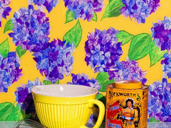 Yellow and Blue hydrangea glass splashback with baking bowl in kitchen