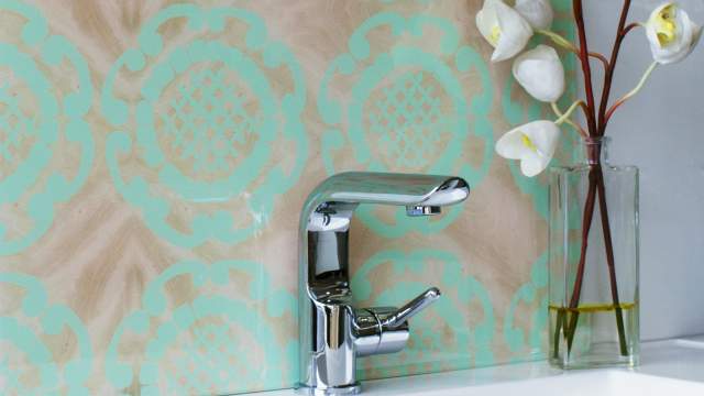 Mint coloured splashback for bathroom vanity unit