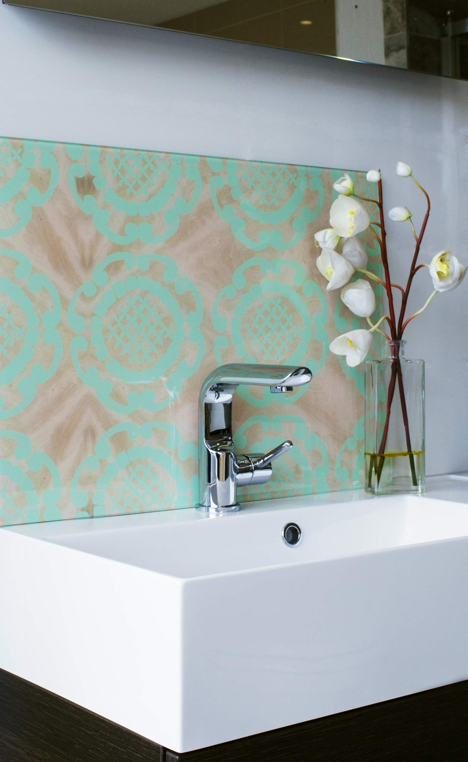 Mint coloured splashback for bathroom vanity unit