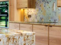 Emma Britton Made to Measure Glass Design in finished artisan wooden kitchen.