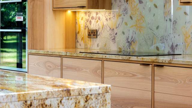 Emma Britton Made to Measure Glass Design in finished artisan wooden kitchen.