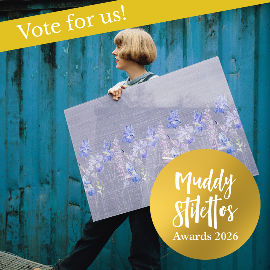 Muddy Stilettos Awards Voting imagery, hyperlinked image. Emma Britton carrying her Watercolour in Grey splashback.