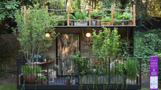Tales from the Riverbank Garden at RHS Chelsea Flower Show showing Emma Britton glassware in the foreground